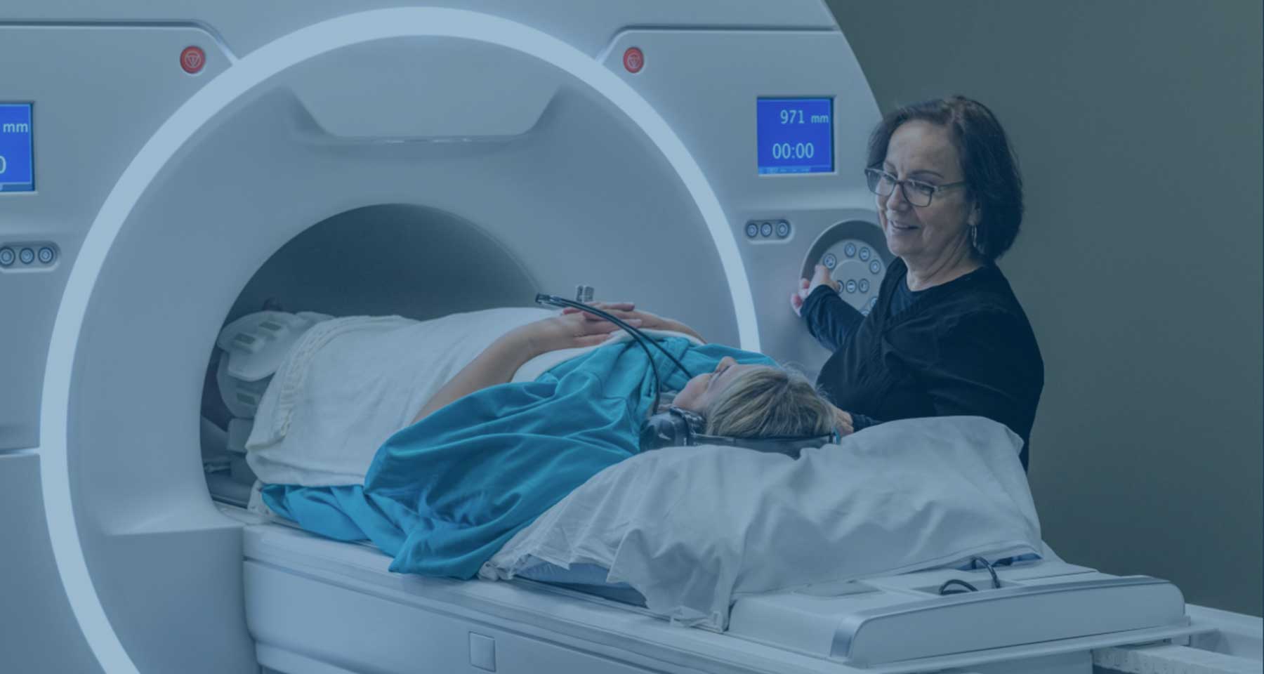 Technician performing MRI